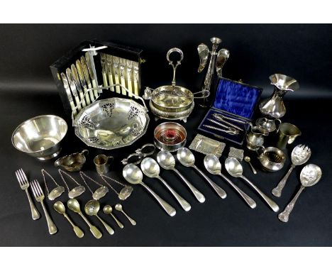 A quantity of silver plated items including a modern stylised Angel candlestick, four spirit bottle labels, jugs, a set of ca