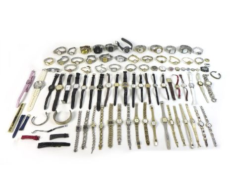 A collection of watch related tools and wristwatches, including a watch link removal tool, some spare Seiko 1.55v batteries, 