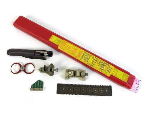 A group of six watch maker's tools, comprising a Bradux watch hand hole size gauge, a brass Martin mainspring gauge ruler, tw