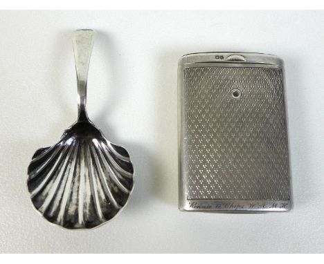 A George III silver caddy spoon, with shell form bowl, 8.5cm long, possibly Thomas Wallis II, London 1808 and a silver vesta 