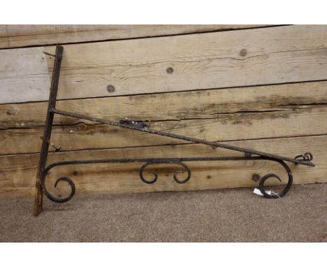 Wrought metal wall mounted bracket for hanging sign/basket, decorated with scroll work, L109cm   Condition Report   Click her