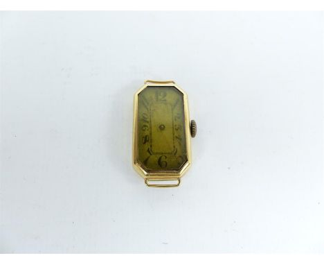 An Art Deco, 18 ct yellow gold, ladies wristwatch case and dial, composed of an elongated face with black, enamel Arabic nume