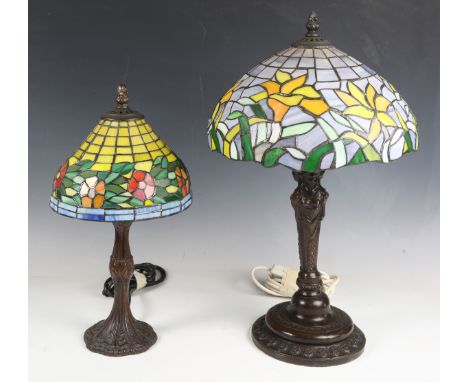 A modern Tiffany style bronze patinated metal table lamp with opaque stained and leaded glass shade, height 50cm, together wi