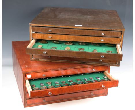 A large collection of 20th century souvenir caddy spoons, contained within two collector's cabinets.Buyer’s Premium 29.4% (in
