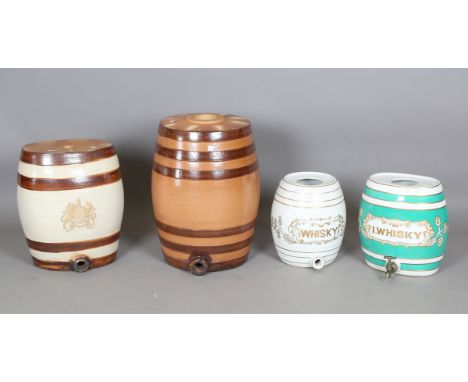 A 19th century stoneware barrel with sprigged Royal coat of arms to front, height 43cm, another large stoneware barrel and tw