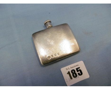 A miniature hallmarked silver hip flask