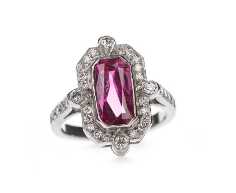 RUBY AND DIAMOND RING, the lozenge shaped ruby of approximately 2.59 carats, within a halo of round brilliant cut diamonds, o