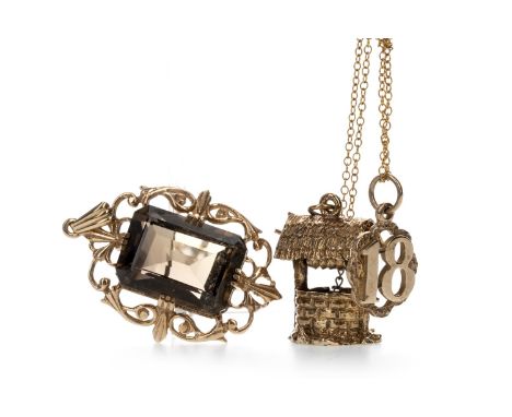 BROWN GEM SET PENDANT, the step cut gem within an openwork mount, in nine carat gold, a nine carat gold '18' pendant on an un