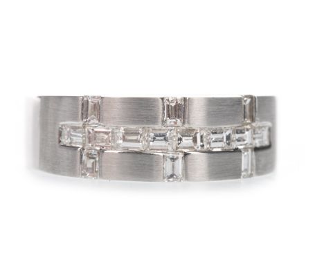 DIAMOND BAND, 7mm wide, set with baguette cut diamonds totalling approximately 0.80 carats, in eighteen carat white gold, siz