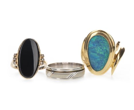 OPAL DOUBLET RING, the opal doublet 18mm long, marked 750, with sizing bar, along with a black hardstone and diamond ring, th