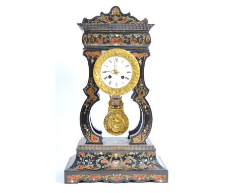 A 19th Century French antique ebony / ebonised portico clock. Inlaid with brass scrollwork and tortoiseshell panels with moth