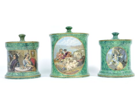 A collection of three 19th Century English antique prattware Tobacco pots all having green malachite and gilded decoration to