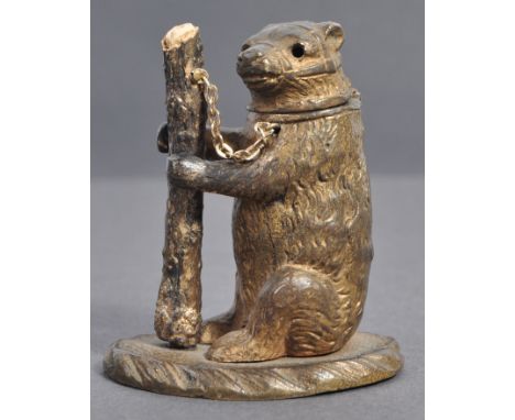 A 19th Century antique bronze / brass match strike / striker in the form of a captive dancing bear cub. Modelled with muzzle 