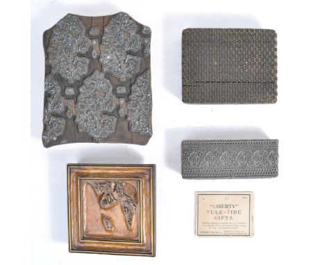 A rare collection of x4 early 20th century Liberty &amp; Co of London used fabric printing blocks. The blocks of four differi