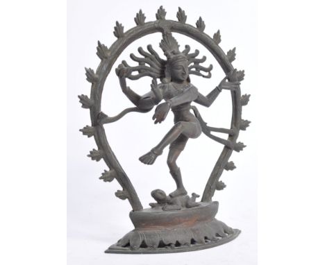 An 18th / 19th Indian bronze figurine of Shiva Nataraja God of Dance in halo of flames standing on a dwarf like creature "apa