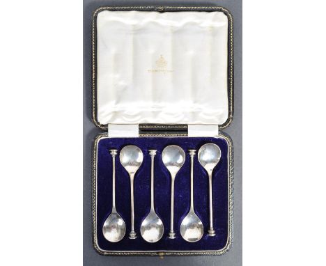 A set of six early 20th Century English antique hallmarked silver coffee / tea spoons by Elkington & Co. The bowls of circula