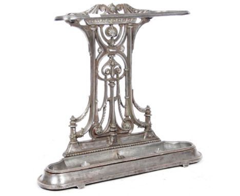 A 19th Century Victorian cast iron stick stand stick / umbrella stand in the manner of Coalbrookdale of comprising of scroll 