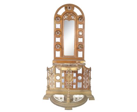 A rare and impressive large 19th Century Victorian Coalbrookdale manner cast iron hall stand. Arched back section with centra