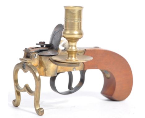 An early 20th Century antique&nbsp;Flintlock tinder pistol lighter likely European or American, with&nbsp;handle foliate carv