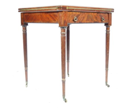 A 19th Century English antique rosewood envelope card / games table in he manner of Gillows having a four section folding met