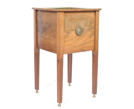 A 19th Century flame mahogany planter jardiniere of square form having an inset removable brass liner. Single small drawer to