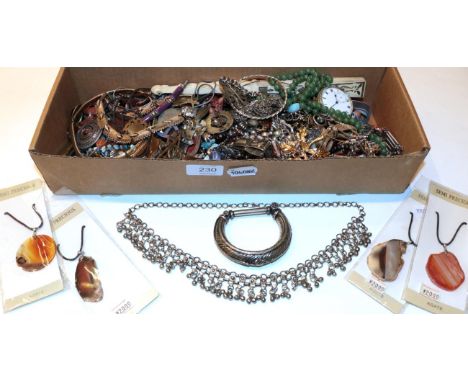 A quantity of costume jewellery including various Siam silver, a jade-type bead necklace, enamel badges, a white metal cased 