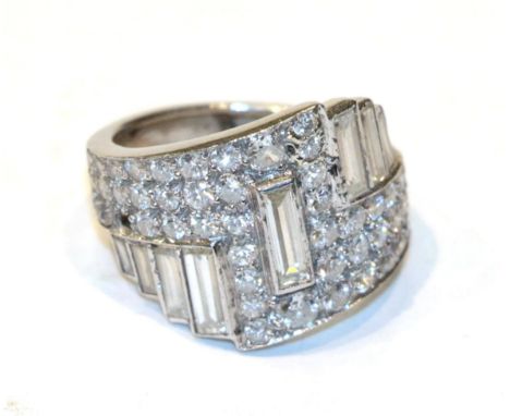 A diamond cluster ring, unmarked, finger size I  NB: one diamond deficient .  Gross weight 6.9 grams. 