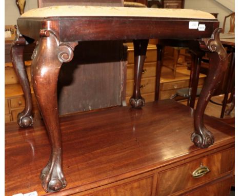 A 1920s stool with claw and ball feet 