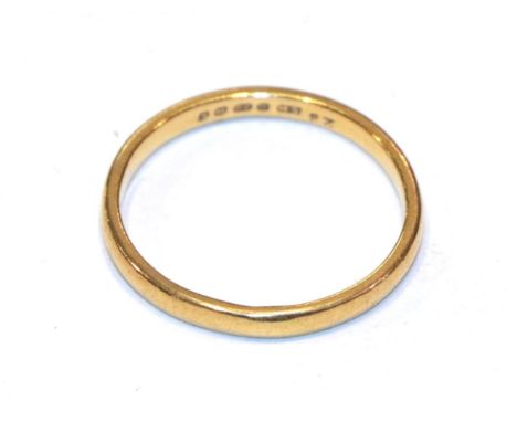 A 22 carat gold band ring, finger size P.  Gross weight 2.8 grams. 