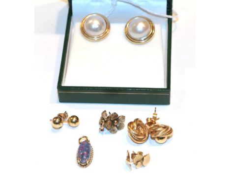 A pair of 9 carat gold and pearl earrings, with post and clip fittings; three further 9 carat gold pairs of stud earrings, wi