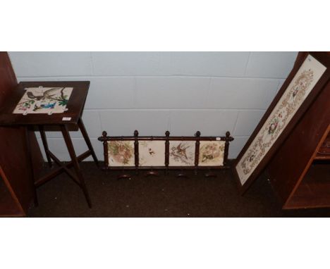 An Edwardian mahogany plant stand, the square top inset with a 10'' Longwy tile, decorated with birds, stamped LONGWY Z 1085,