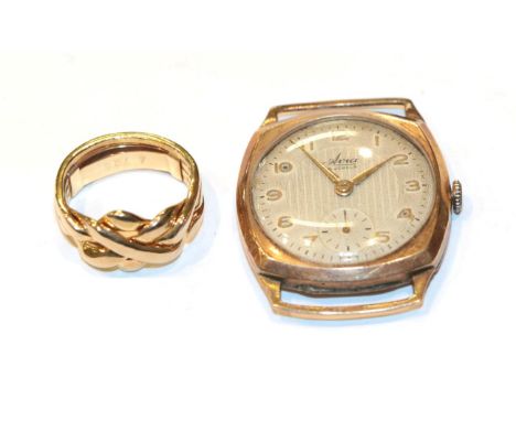 A 9 carat gold puzzle ring, finger size L; and a watch face .  Puzzle ring - 4.9 grams 