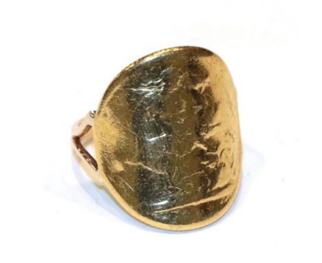 A bent sovereign ring (worn), finger size O.  Shank stamped '9CT'. Gross weight 8.6 grams. 