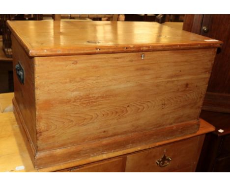 A pine trunk with hinged lid; and a simulated bamboo bedroom chair (2)