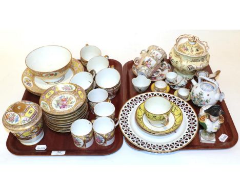 Two trays of 19th century Continental porcelain including: a gilt floral decorated part tea-service; miniature cups and sauce