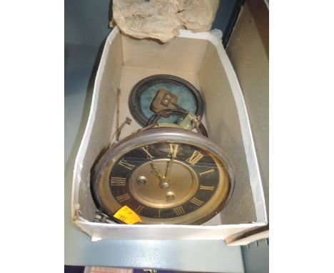 A clock face and movement mechanism with black and gold face
