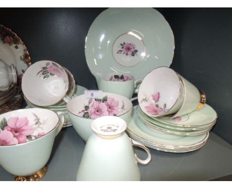 A part tea service by Royal Sheriton in the Hedge Rose pattern