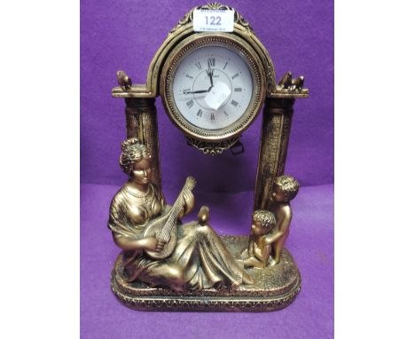 A figural design mantle clock with gilt effect finishLooks good but no battery to test