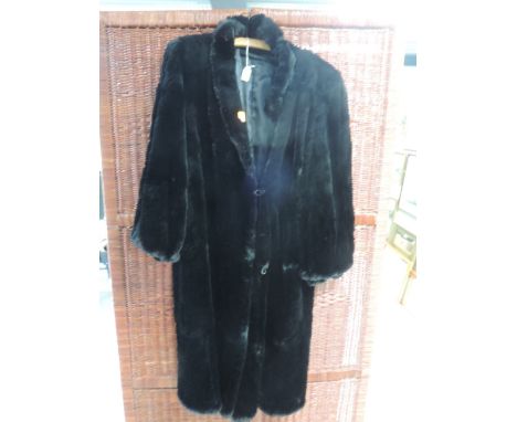 Vintage Black fur coat, approx 1930s. some light wear and small areas of damage. Around a medium to large.