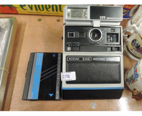 A Kodak EK6 polariod camera and Walkman style cassette player