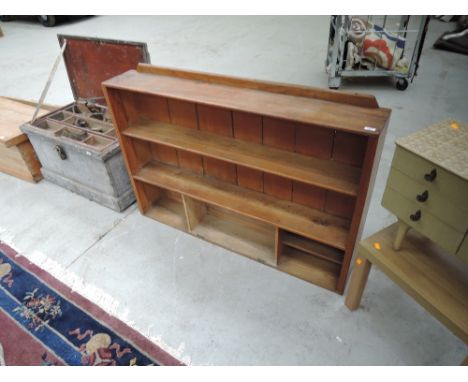 A vintage oak shelf unit