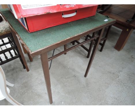 A traditional folding card table