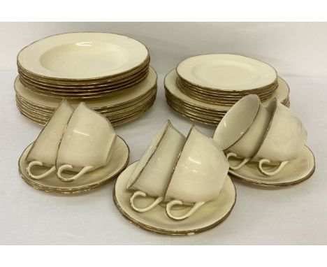 A quantity of vintage Alfred Meakin ceramic tea and dinner ware items. Cream coloured glaze with gilt rim design. Comprising: