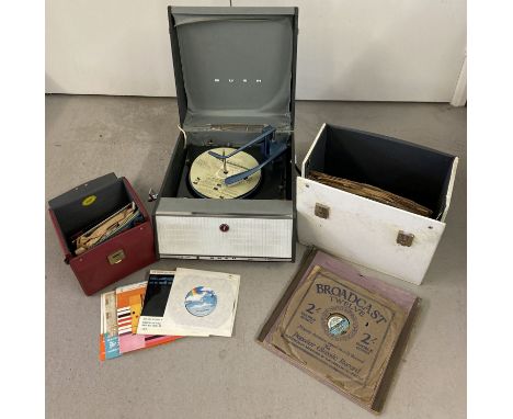 A vintage Bush Monarch portable record player (SRP.31D) together with 2 cases of vintage records.  