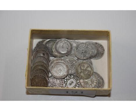 A collection of silver thru'penny pieces 