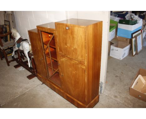 A N.G. Exclusive Art Deco graduating combination cabinet, fitted drop down front revealing pigeon holes, pen rest and leather