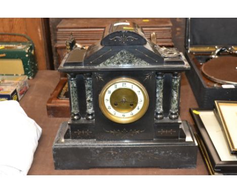 A two hole slate and marble cased mantel clock