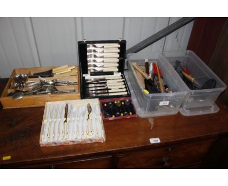 A quantity of various boxed cutlery; two plastic tubs of kitchenalia; and a quantity of silver plated cutlery