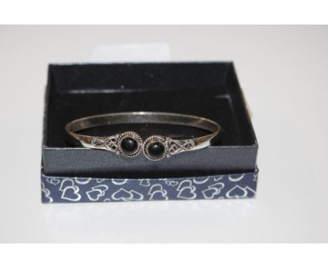 A black onyx and 925 marked bangle 