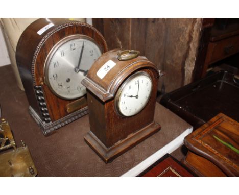 An oak cased French mantel clock